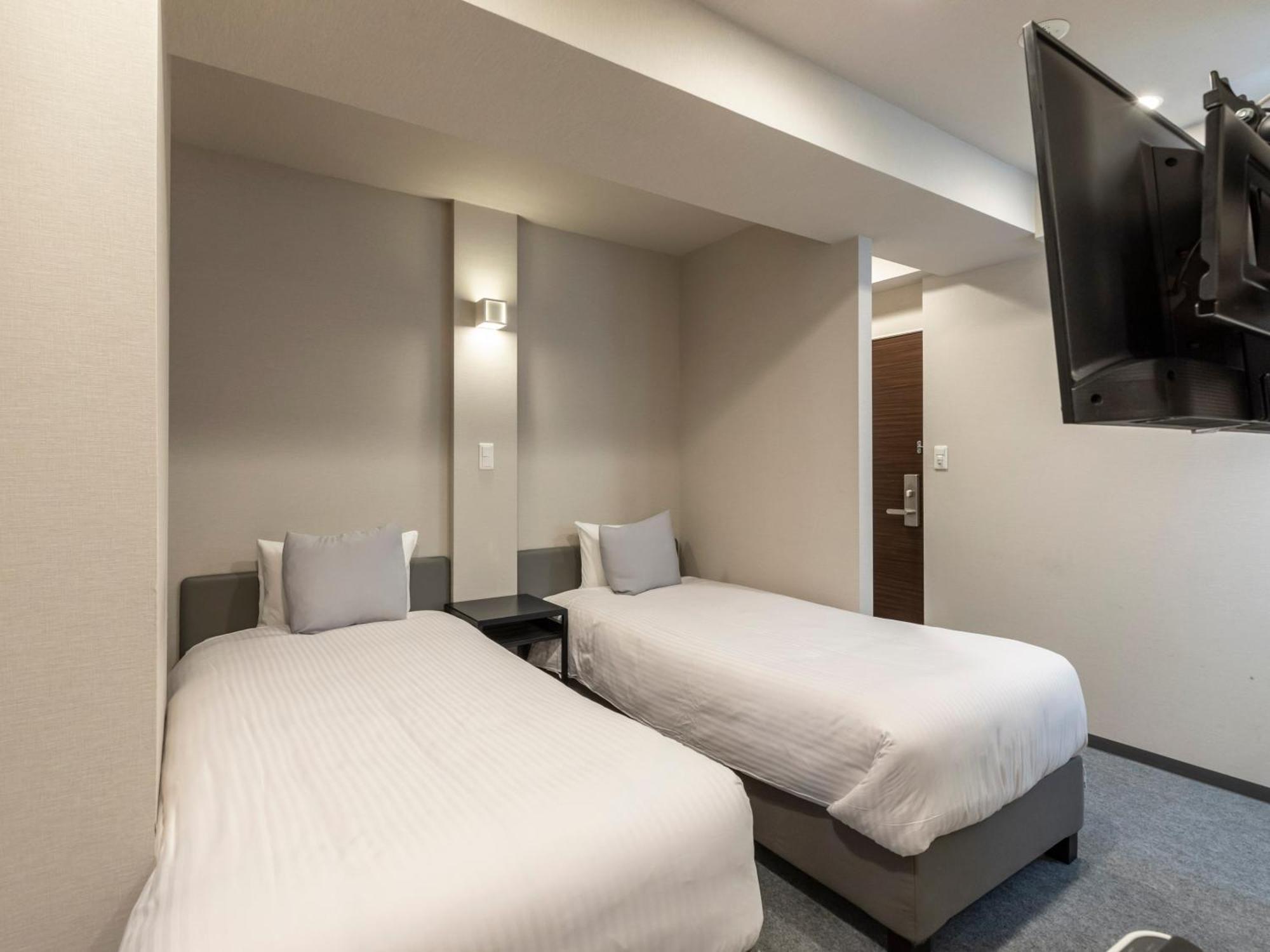 Tabist Unihotel Midosuji Hommachi Osaka Bagian luar foto